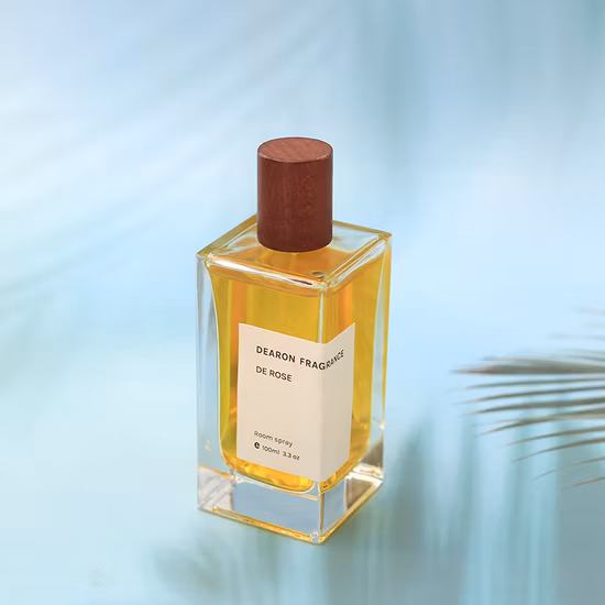Bouteille de parfum d'huile essentielle en verre vide de forme ronde d'échantillon gratuit de 15 ml avec couvercle de pulvérisation